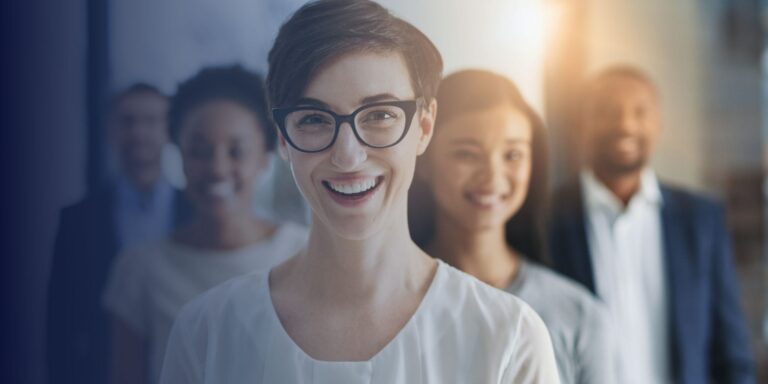 Woman with Glasses infront of other women